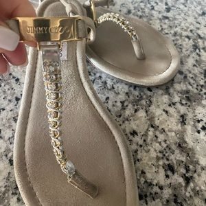 Jimmy Choo sandals with gold  name on the front